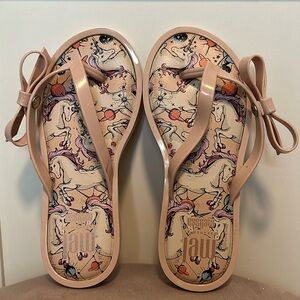 Blush pink Mel by Melissa whimsical and sweet blush pink flip flops in size 12.